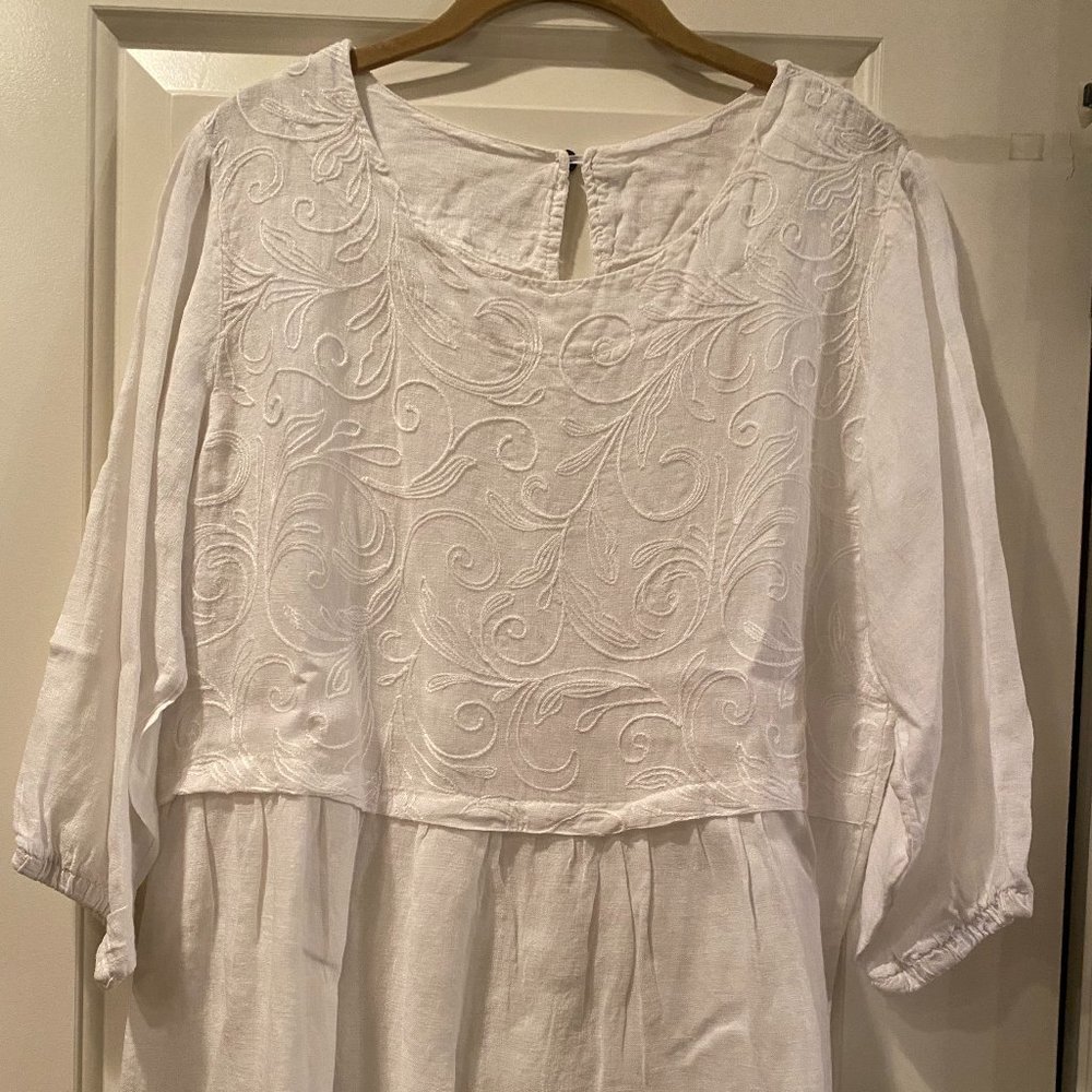 White Embroidered Peplum Top